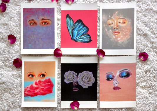 A collection of 6 card prints